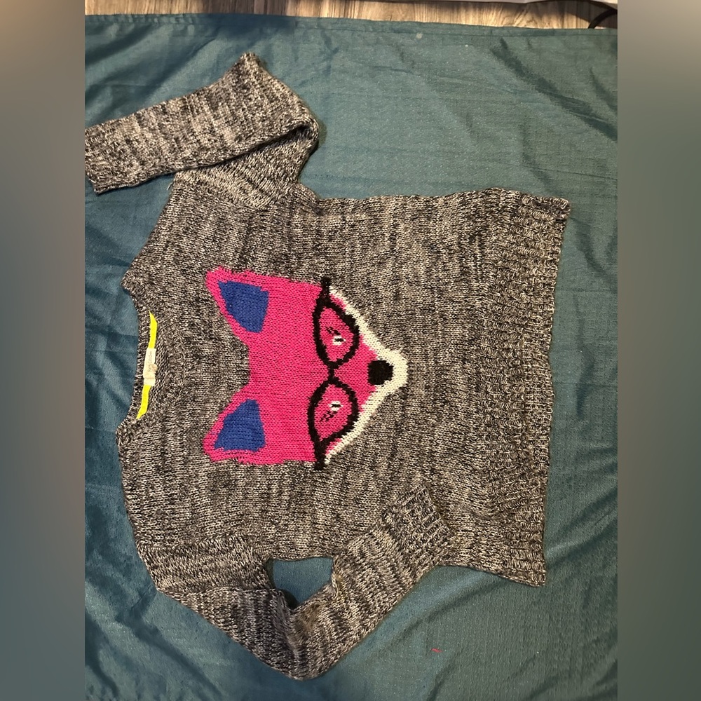 Cute pink fox with glasses cozy’s on to the skin
